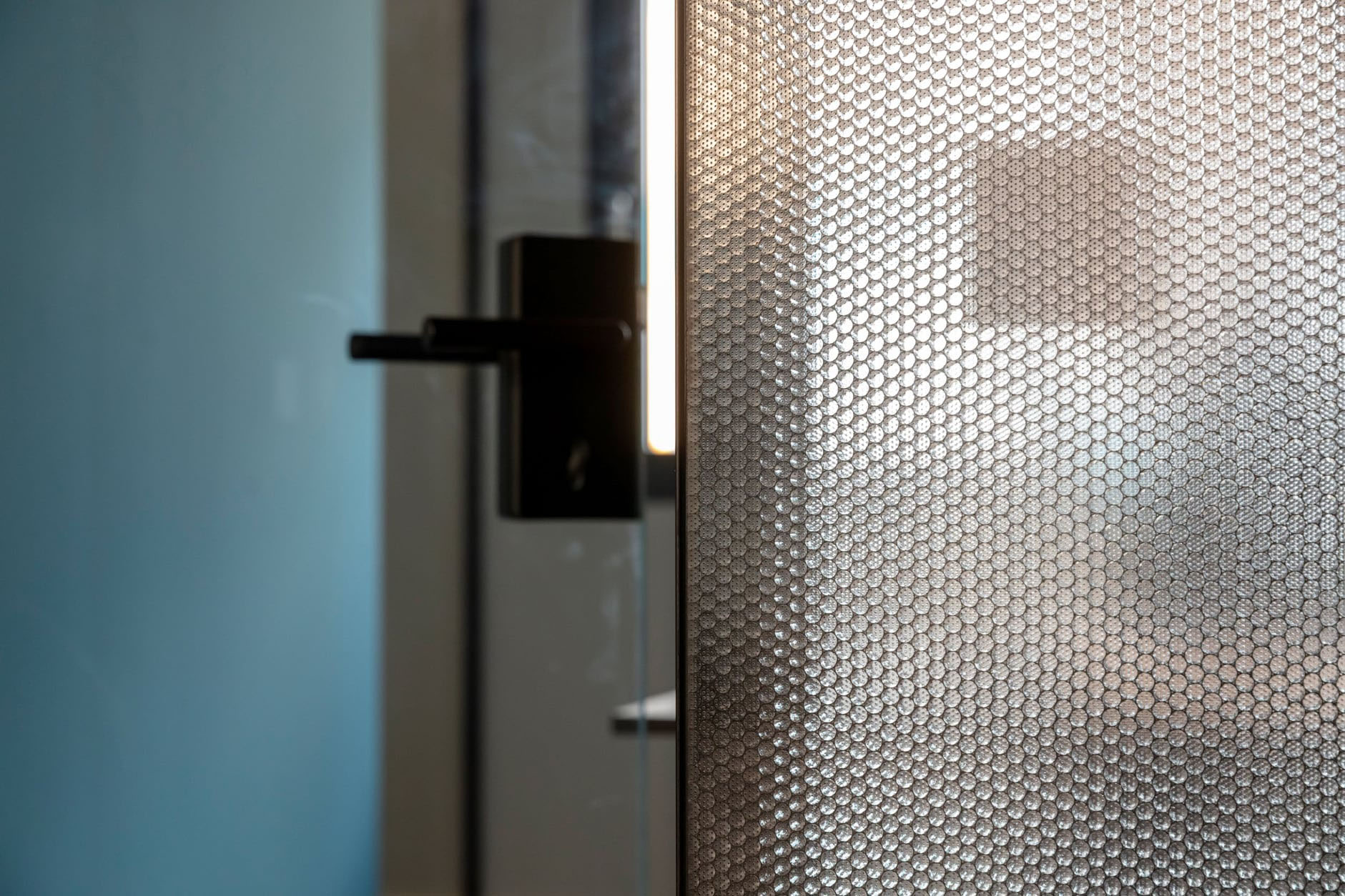 MoxieSurfaces - Black AIR-board panels - office installation detail