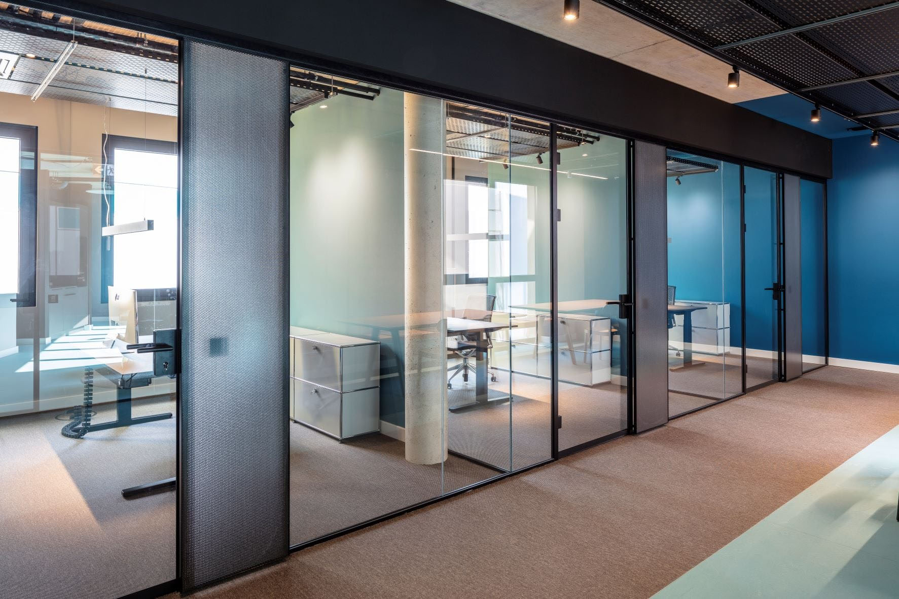 MoxieSurfaces - Black AIR-board panels - office installation