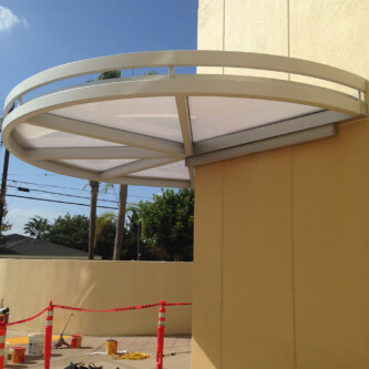 Translucent clear-PEP canopy and covered walkway for tall residential and office buildings Translucent clear-PEP canopy and covered walkway for tall residential and office buildings